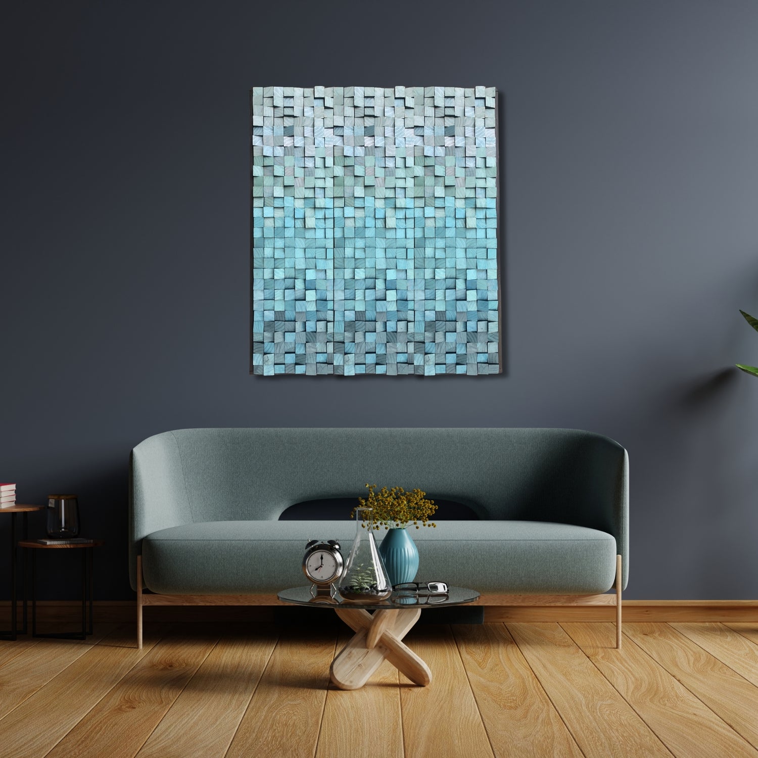 Handmade blue gradient wooden mosaic wall art with sculptural texture, displayed above a modern teal sofa in a stylish living room with wooden floors and minimalist decor.