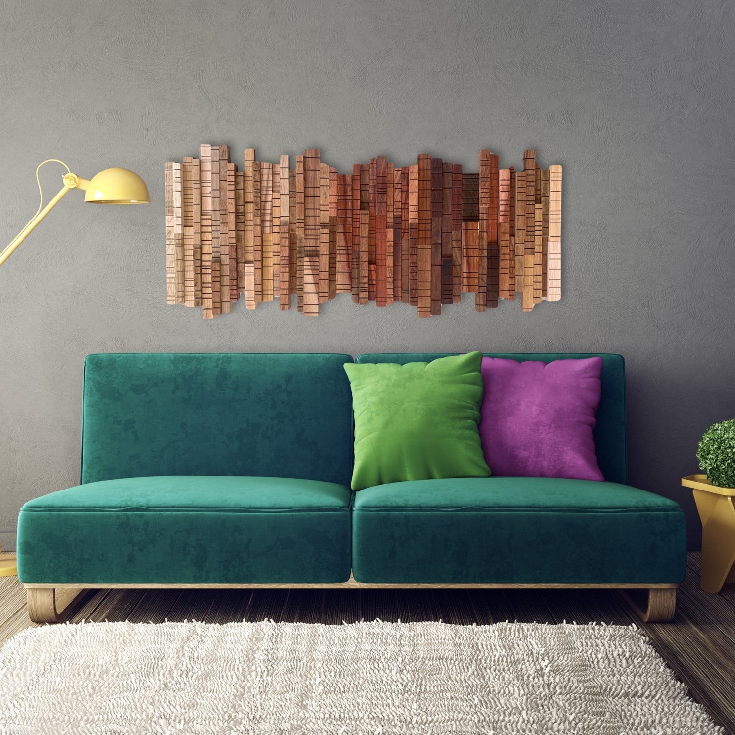 Handcrafted vertical wood wall art from the “A Walk Through the Forest” collection, featuring layered strips of exotic hardwoods in warm, earthy tones, mounted above a bold green velvet sofa with colourful pillows in a playful, modern living room.