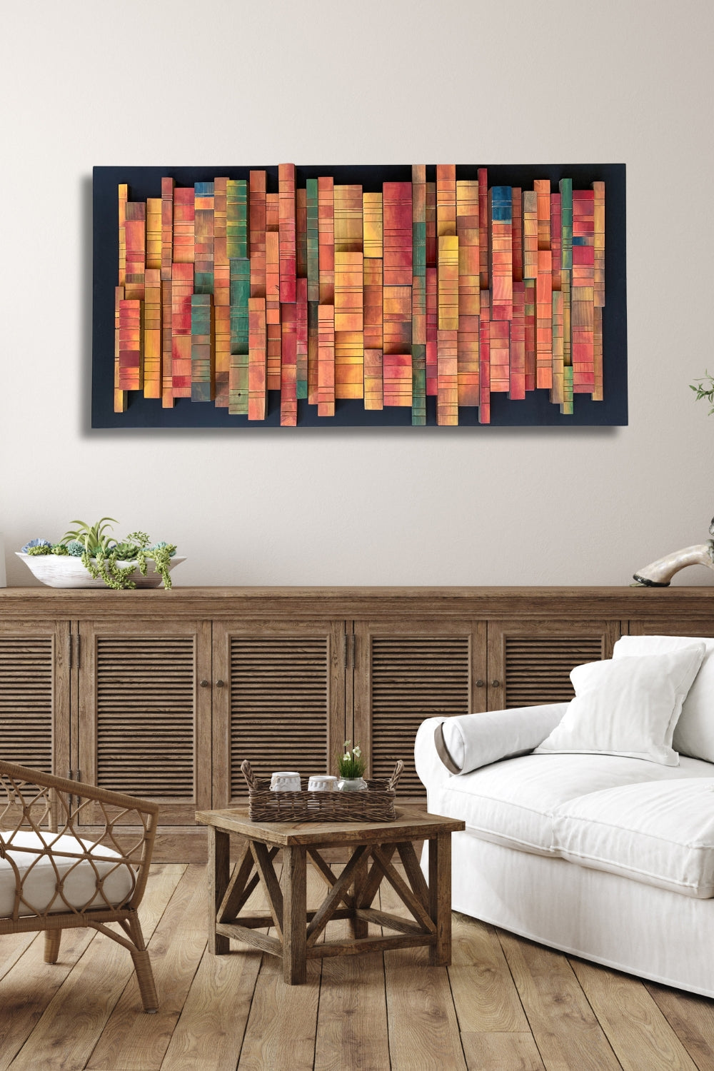 Autumn Forest wooden wall art with warm painted colour accents displayed above a wooden sideboard in a relaxed living room.