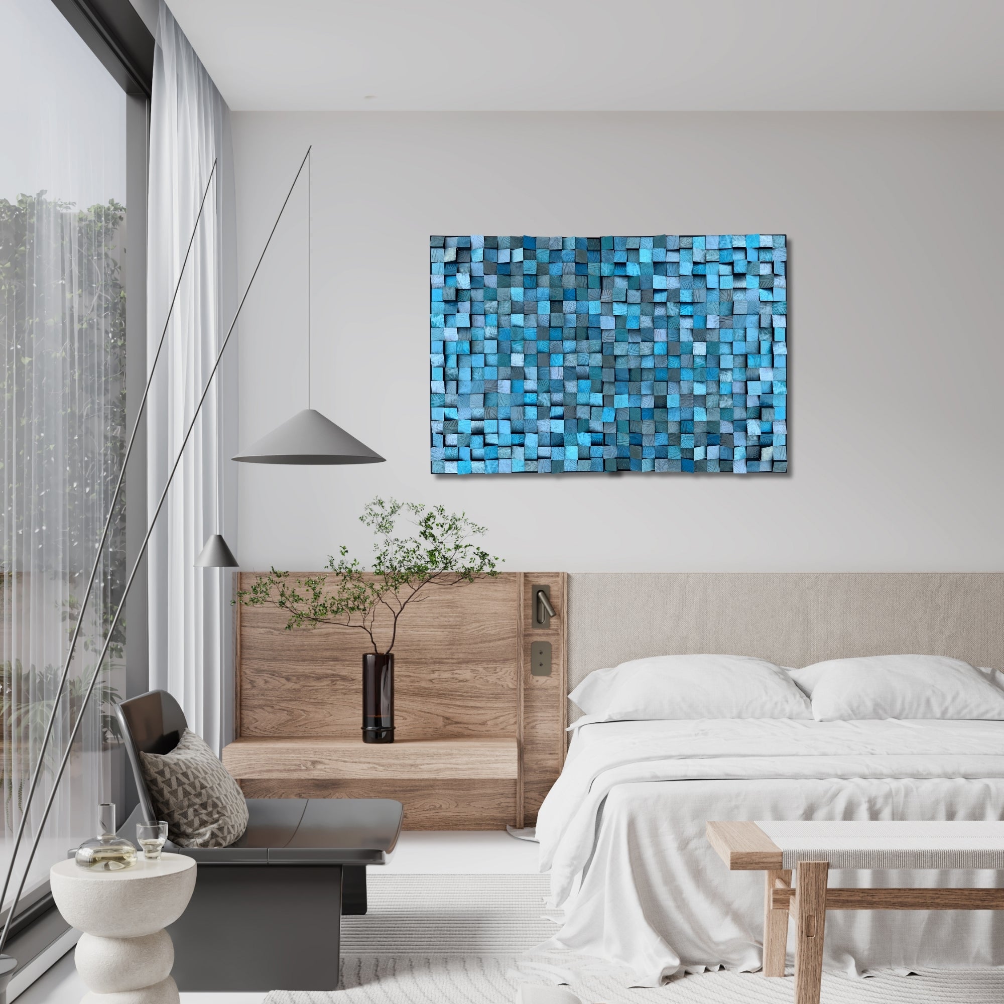 Textured wooden wall art made from hand-cut pine blocks painted in shades of blue with a metallic finish. Features blue liquid metal paint for added depth and shimmer. Sculptural and modern, ideal for bedrooms or contemporary interiors.