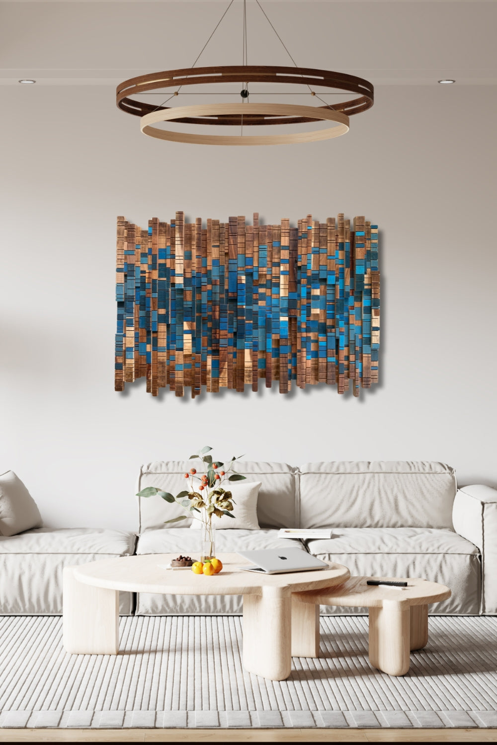 Forest Stream wooden wall art with blue painted accents displayed above a white sofa in a neutral modern living room.
